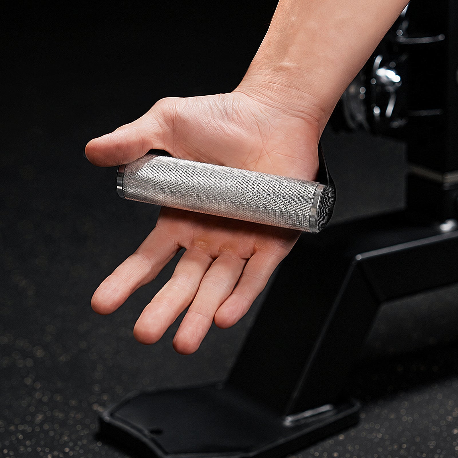 Close-up of the premium knurled aluminum handle grip on the Mikolo FALCON™-2.0 Functional Trainer