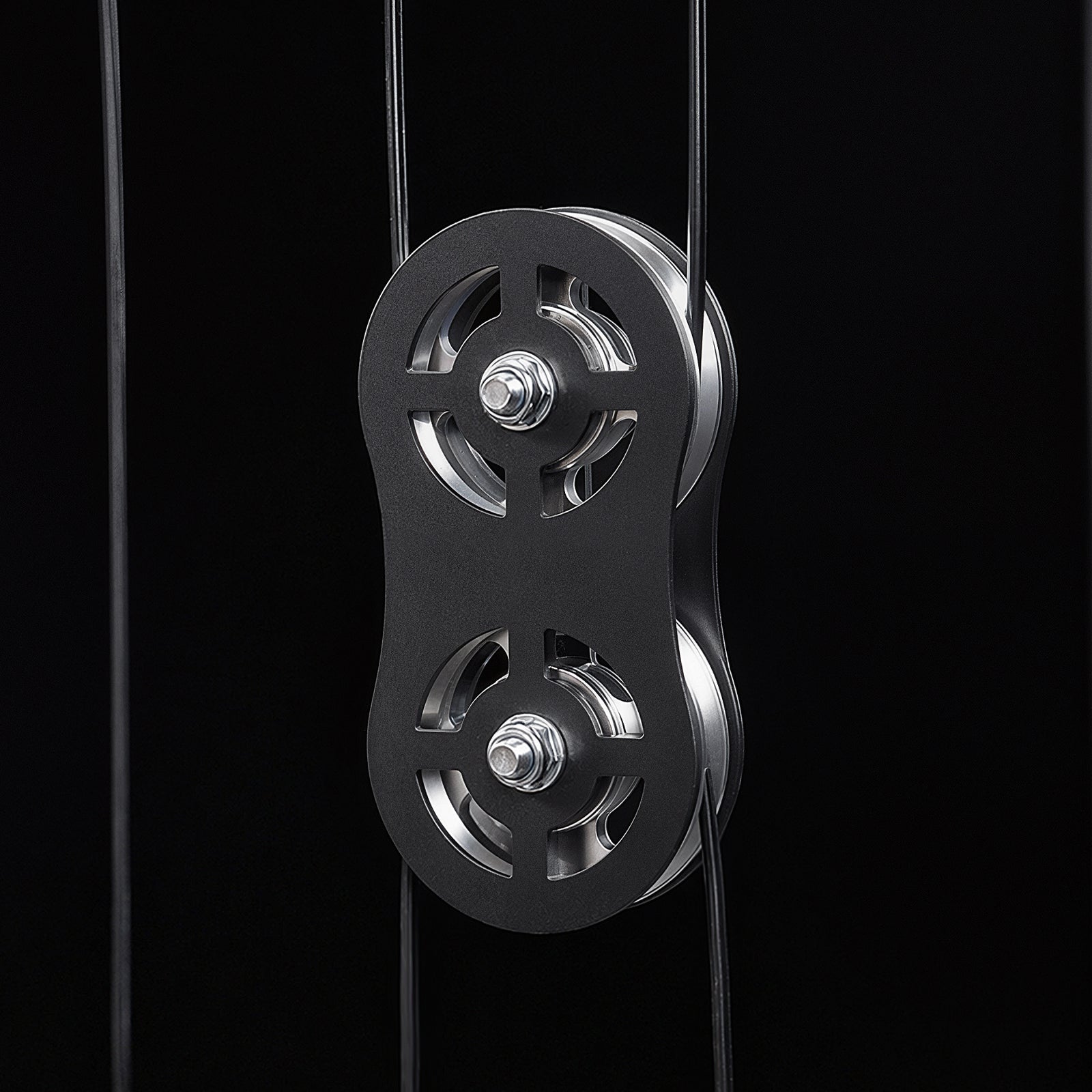 Close-up of the smooth commercial-grade aluminum pulleys on the Mikolo FALCON™-2.0 cable system