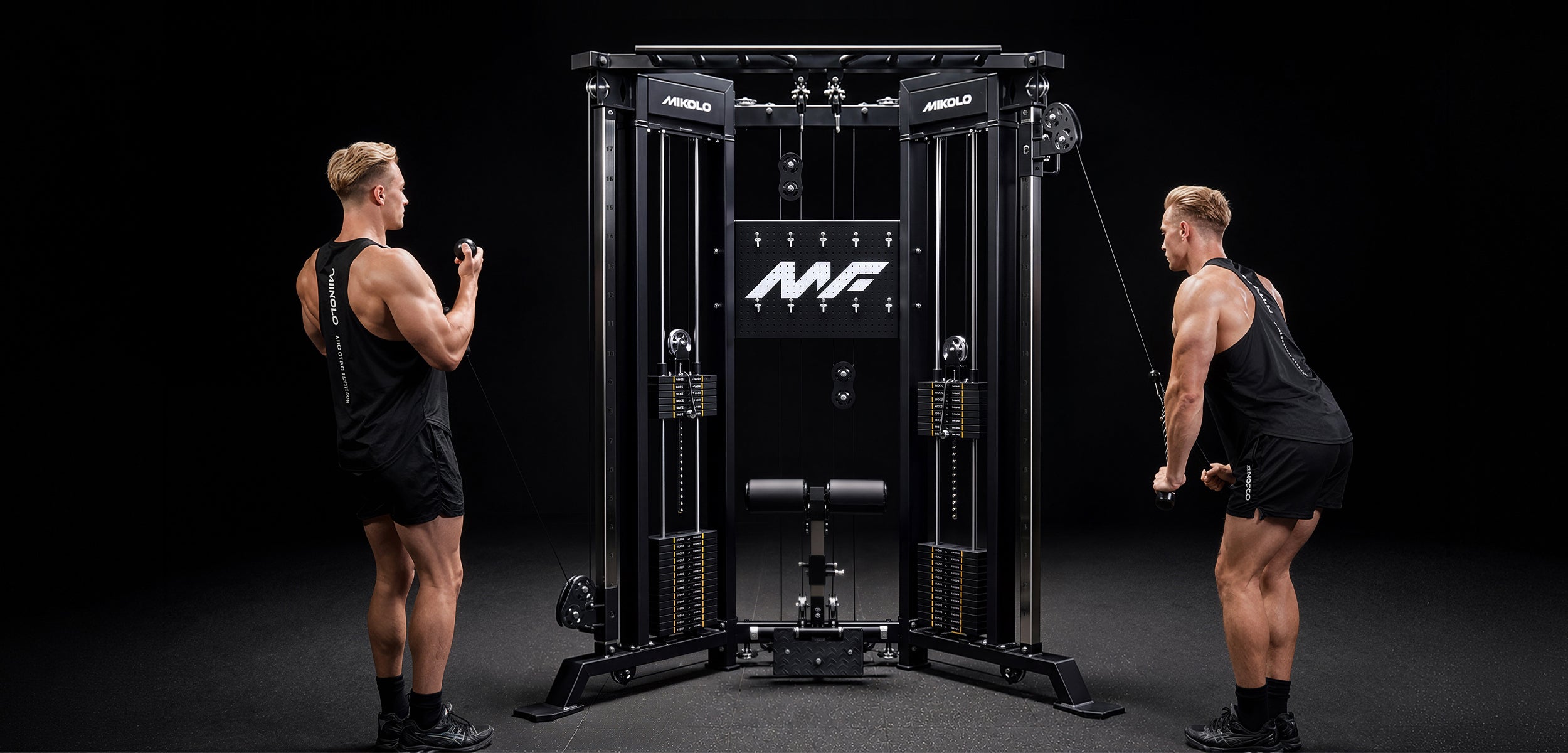 Two users training simultaneously using high and low cable pulleys on the Mikolo Falcon 2.0 Functional Trainer