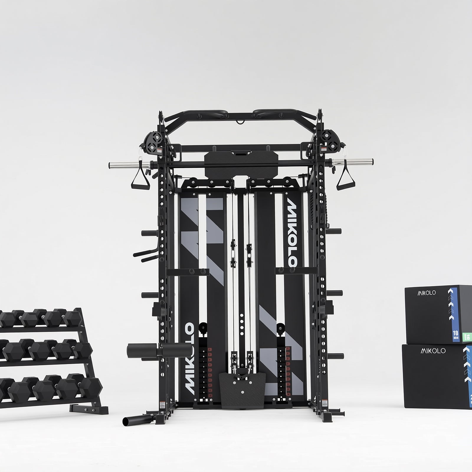 Black Mikolo Smith machine and functional trainer with dual weight stacks, dumbbell rack, and plyometric boxes