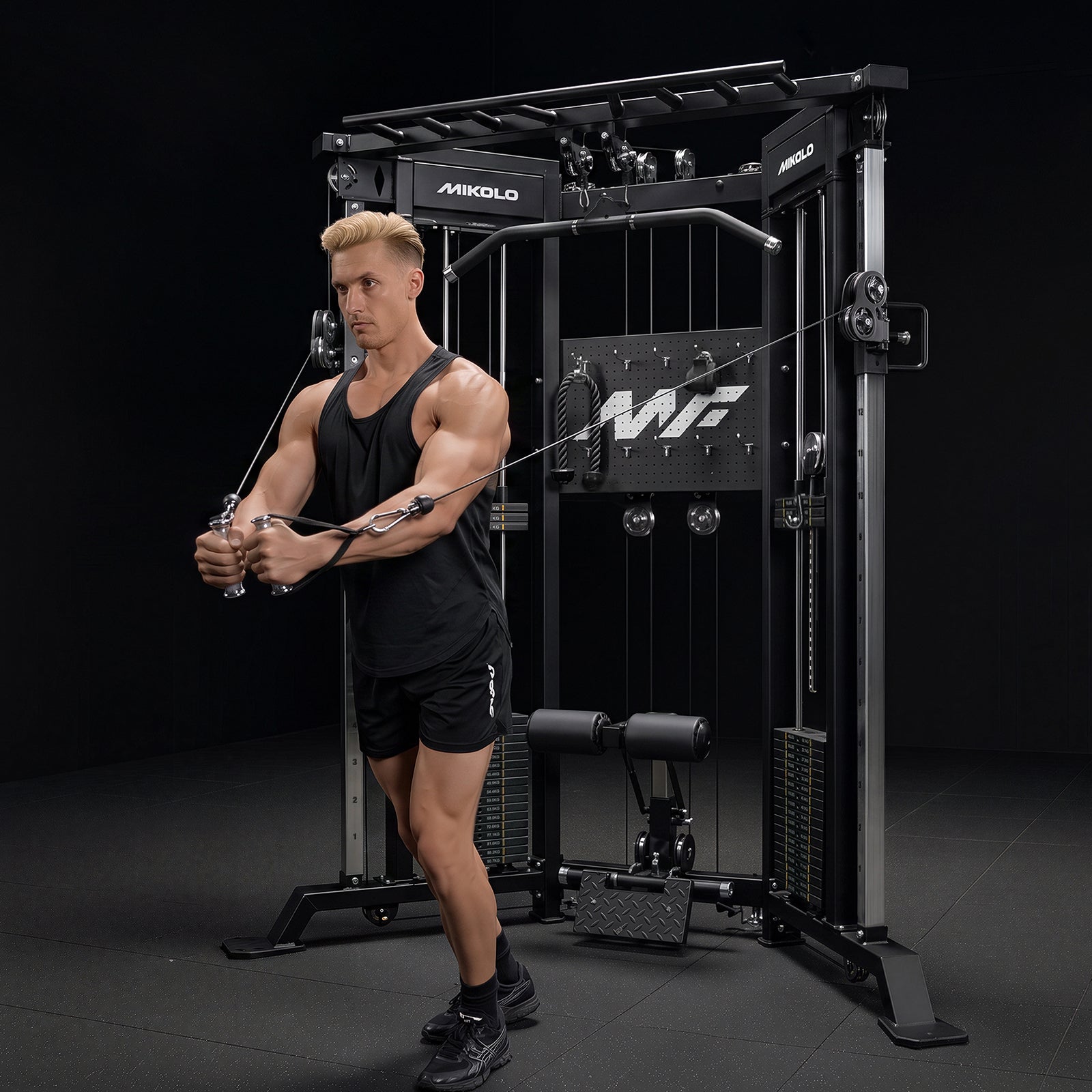 A user performing standing cable crossover flyes on the Mikolo FALCON™-2.0 Functional Trainer