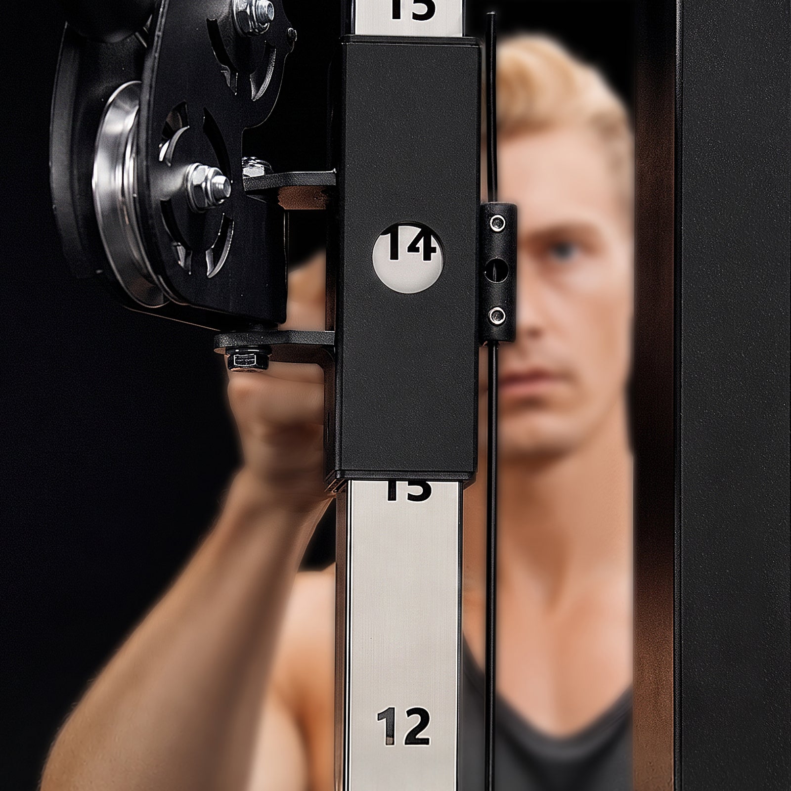 Close-up of laser-etched height numbers on the Mikolo Falcon 2.0 upright post for precise adjustment.