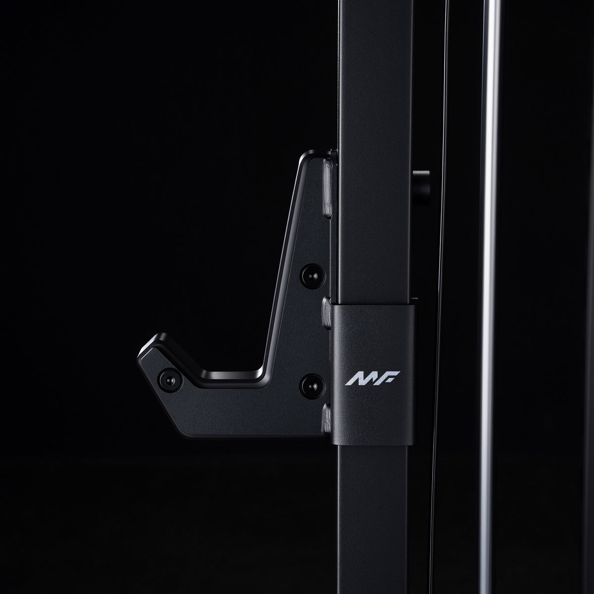 Angled black metal J-hook attached to a vertical rack post, displaying a white MF logo on the mounting bracket