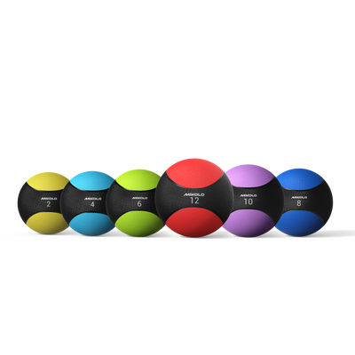 Six Mikolo medicine balls in yellow, cyan, lime, red, purple, and blue, labeled with weights 2, 4, 6, 12, 10, and 8